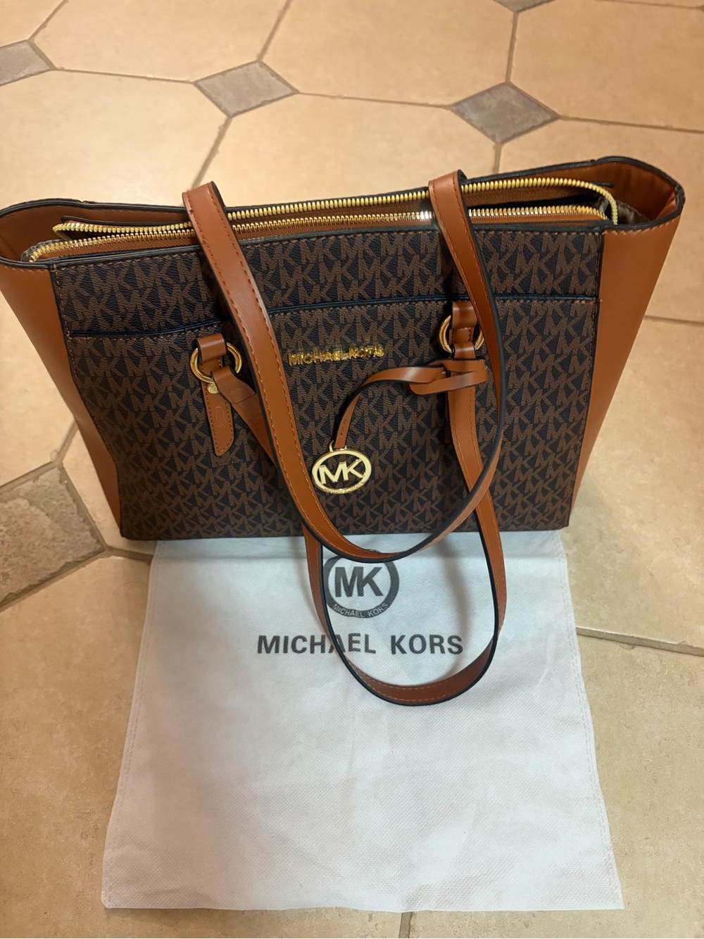 Michael Kors Brown and Tan Logo Tote with Gold Hardware. New with dust bag.